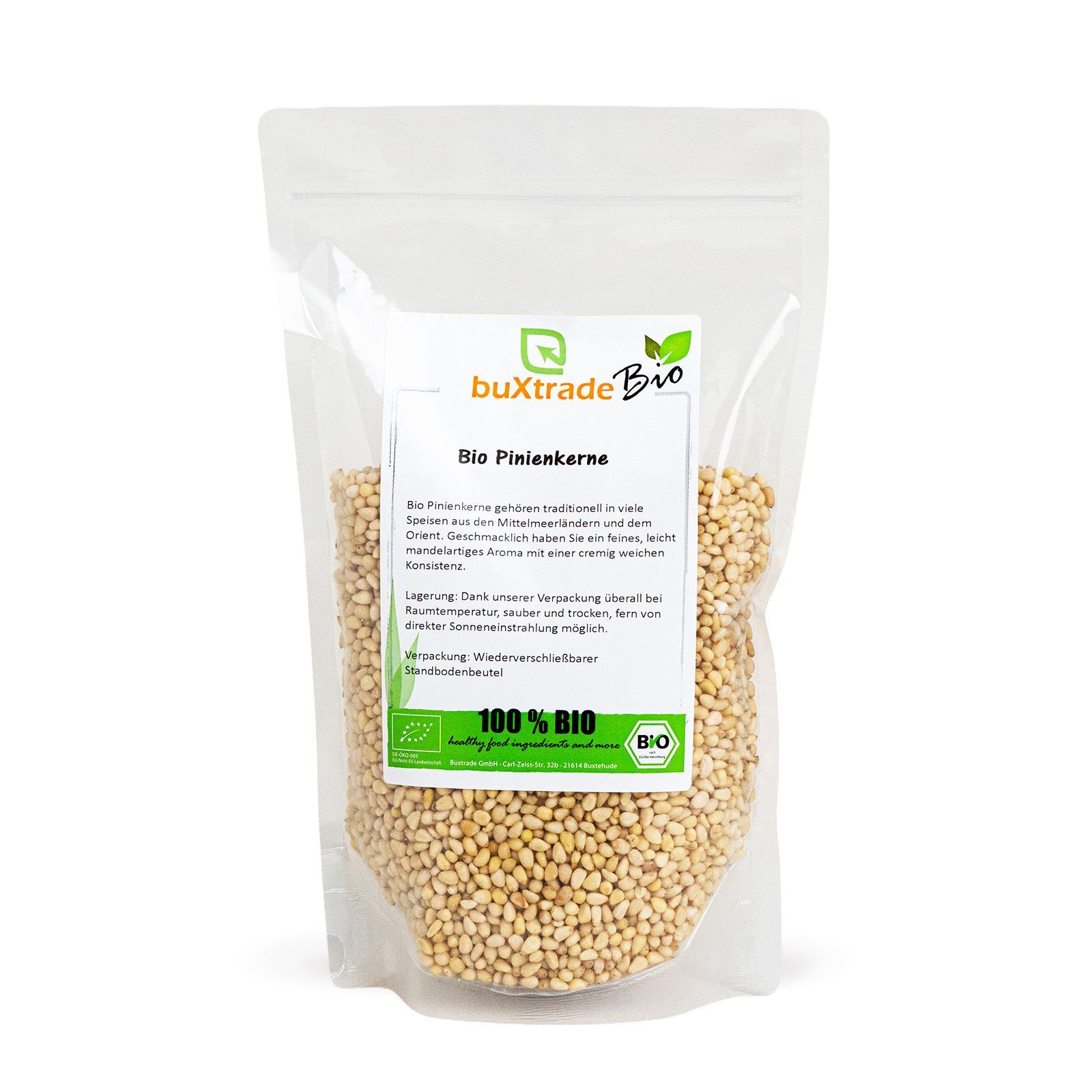 Transparente Verpackung mit Pinienkernen. Aufdruck: buXtrade Bio, Bio Pinienkerne, 100% BIO-Siegel.