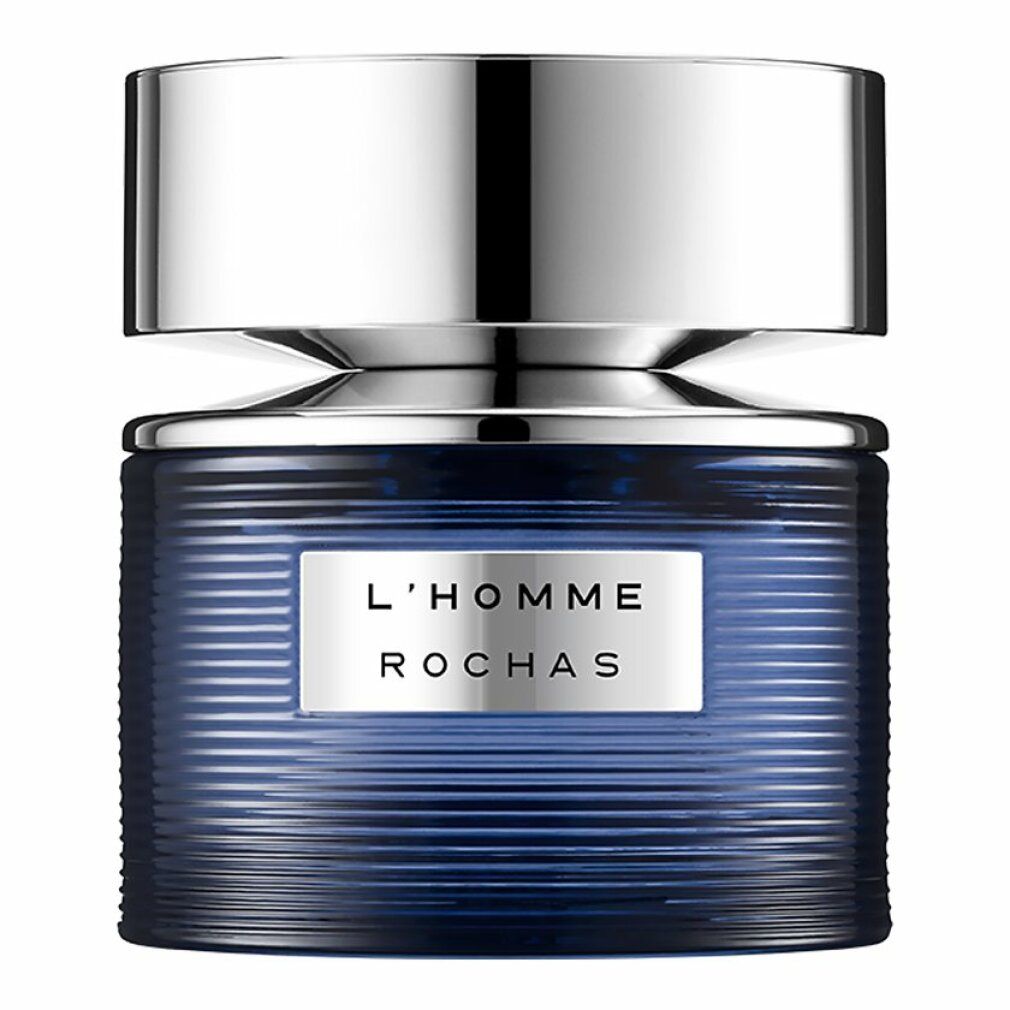 Blauer Glasflakon mit silbernem Deckel. Aufschrift: L'HOMME ROCHAS. Geriffelte Textur.