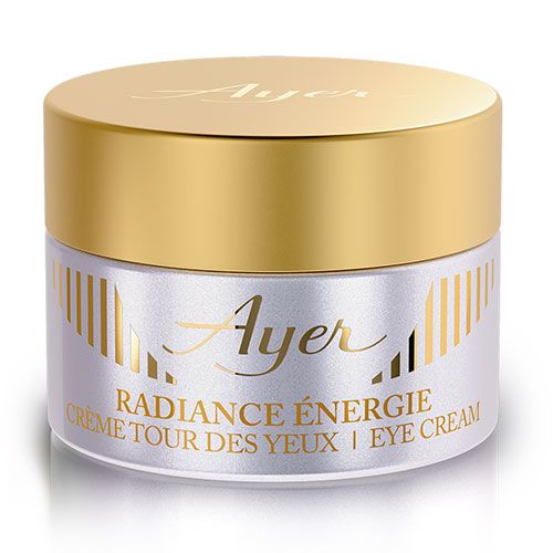 Cremebehälter mit goldenem Deckel. Aufschrift: Ayer, Radiance Énergie Crème Tour des Yeux | Eye Cream.