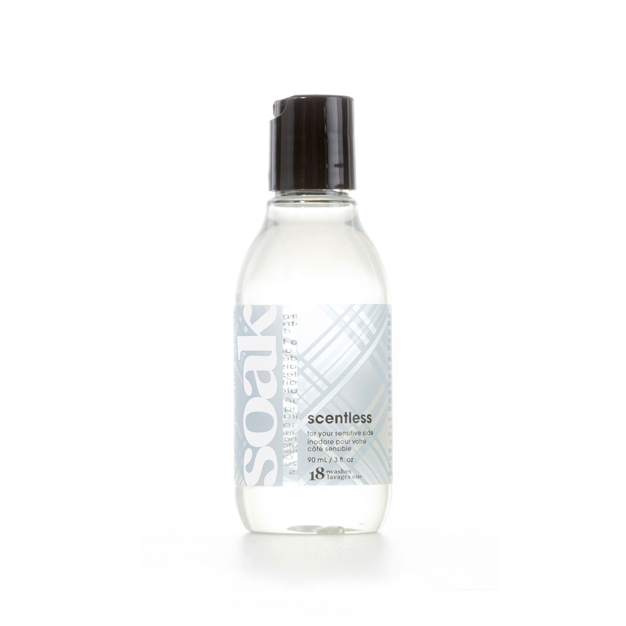 Klare Flasche mit schwarzem Deckel. Aufschrift "soak" und "scentless". Etikett mit Produktinformationen.
