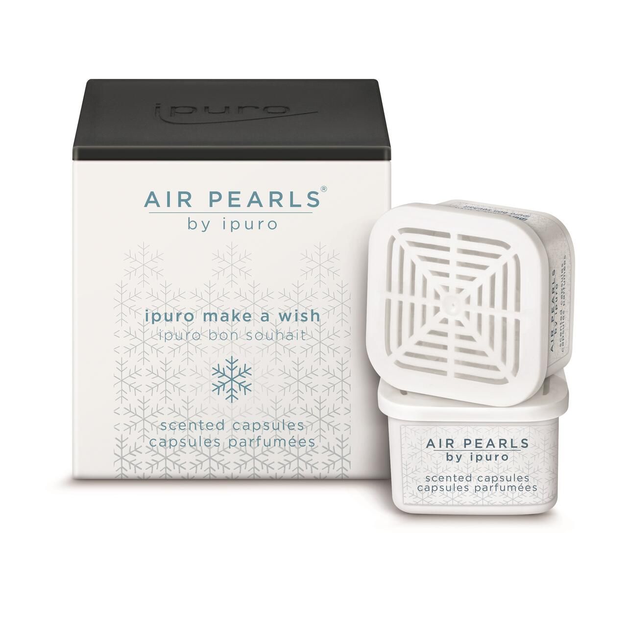 Air Pearls von Ipuro. Weiße Kapseln und Verpackung mit Schriftzug. Aufschrift: Air Pearls, Ipuro Make a Wish, Scented Capsules.