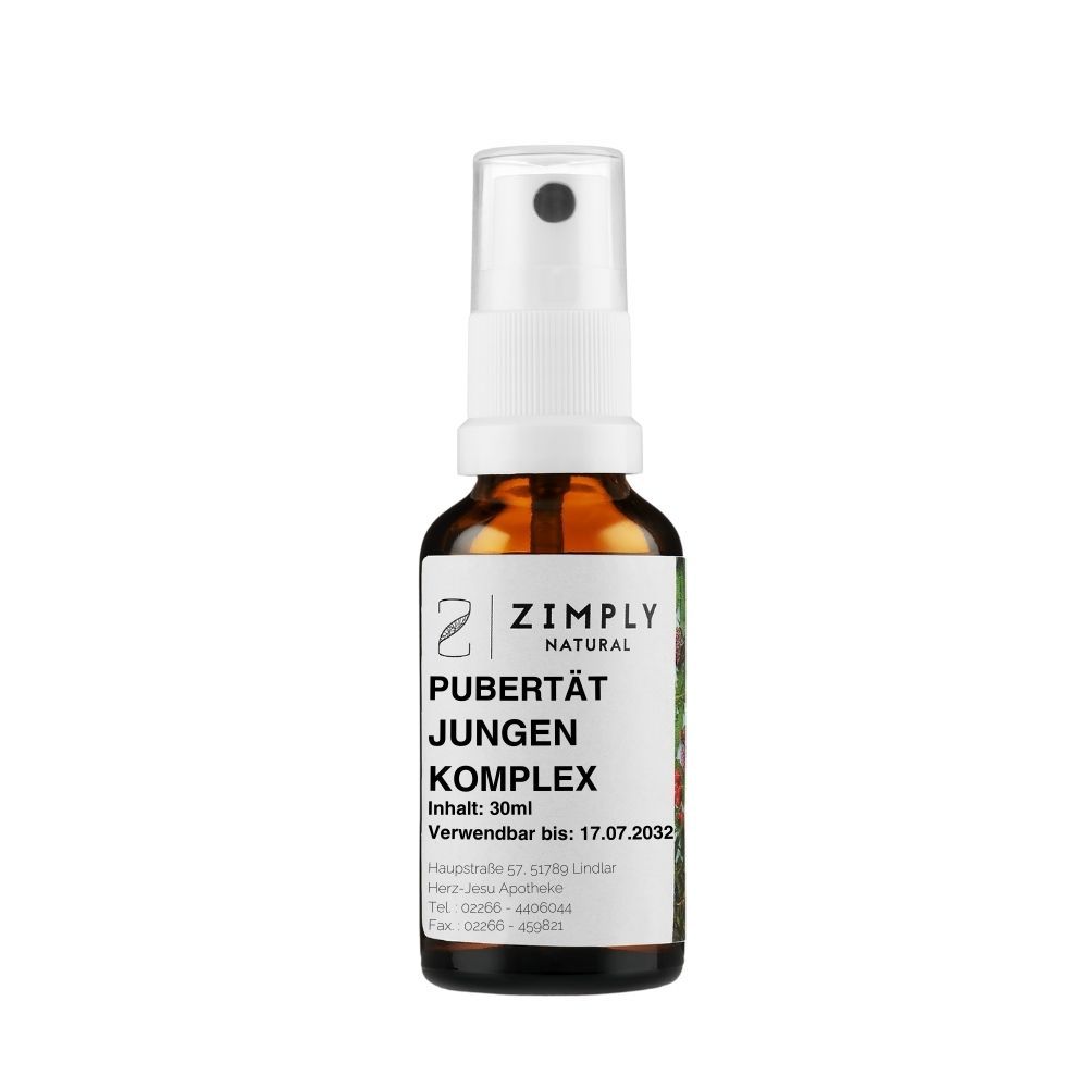 Braune Glasflasche mit weißem Sprühkopf. Etikett mit Produktnamen und Logo. Text: Pubertät Jungen Komplex. Haltbarkeit bis 17.07.2032.