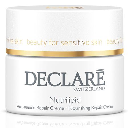 Weißer Tiegel mit goldfarbenem Deckel. DECLARÉ-Logo und Produktname Nutrilipid. Aufschrift: Aufbauende Repair Creme.