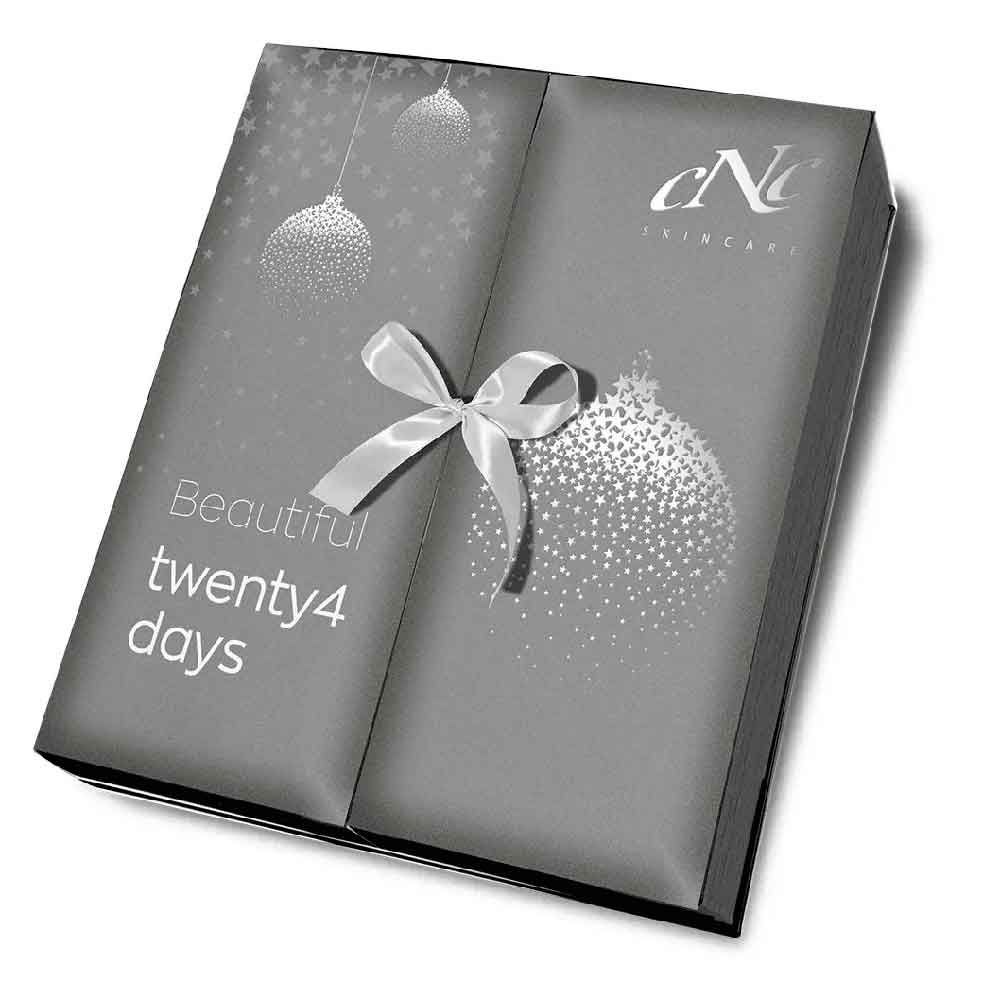 Graue Adventskalender-Box mit Schleife. Aufschrift: Beautiful twenty4 days. Logo: cNc skincare. Mit Weihnachtsdekor.