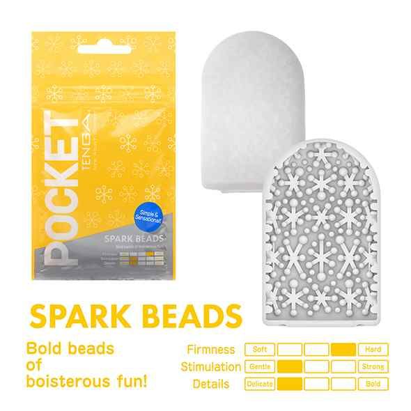 Produktverpackung und zwei weiße, strukturierte Einsätze. Aufschrift Spark Beads und Eigenschaften wie Festigkeit und Stimulation.