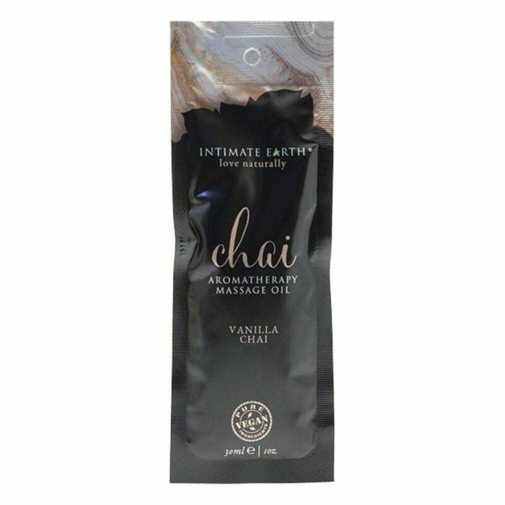 Schwarzer Beutel mit 'Chai' und 'Intimate Earth'. Aromatherapie Massageöl. 'Vanilla Chai'. Vegan-Siegel. 30ml/1oz.