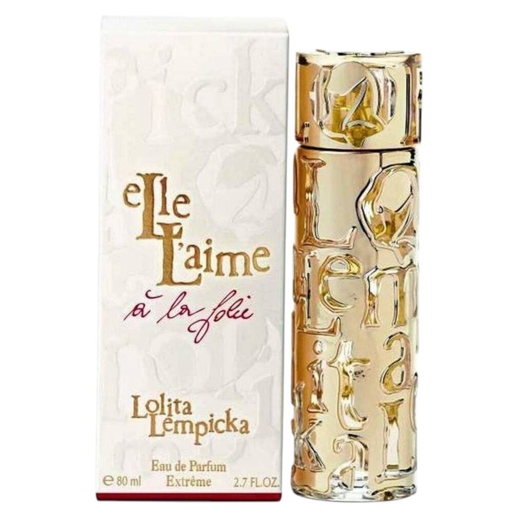 Goldfarbener Flakon und weiße Schachtel. Aufschrift: Elle L'aime à la folie, Lolita Lempicka, Eau de Parfum. Flakon mit Schriftzug.