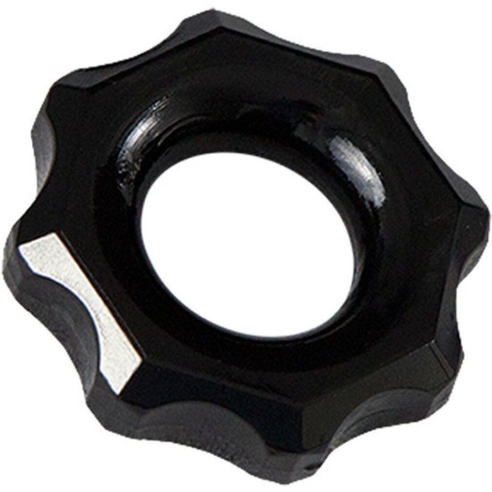 Schwarzer Ring mit wellenförmiger Außenkante und Innenloch. Ein silberner Akzent ist sichtbar.