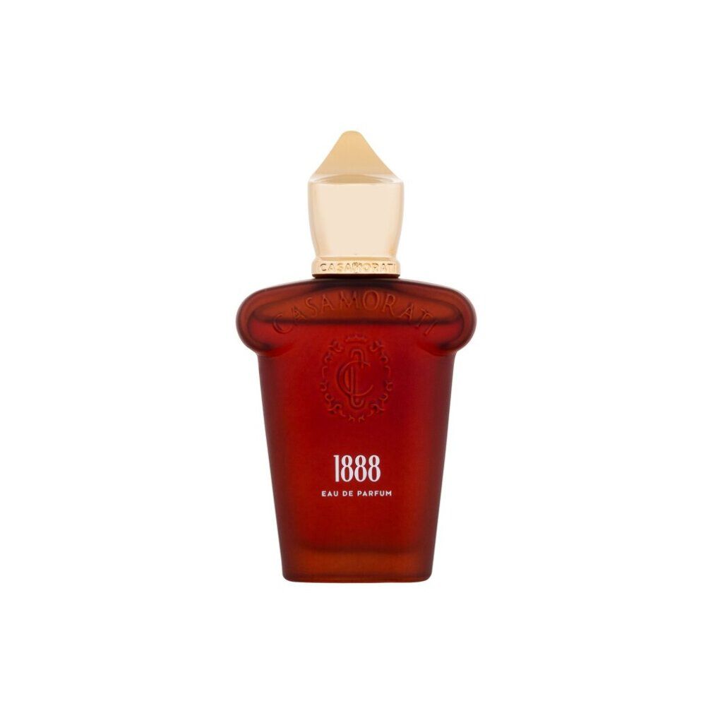 Roter Flakon mit goldfarbenem Verschluss. Aufschrift "1888 Eau de Parfum".