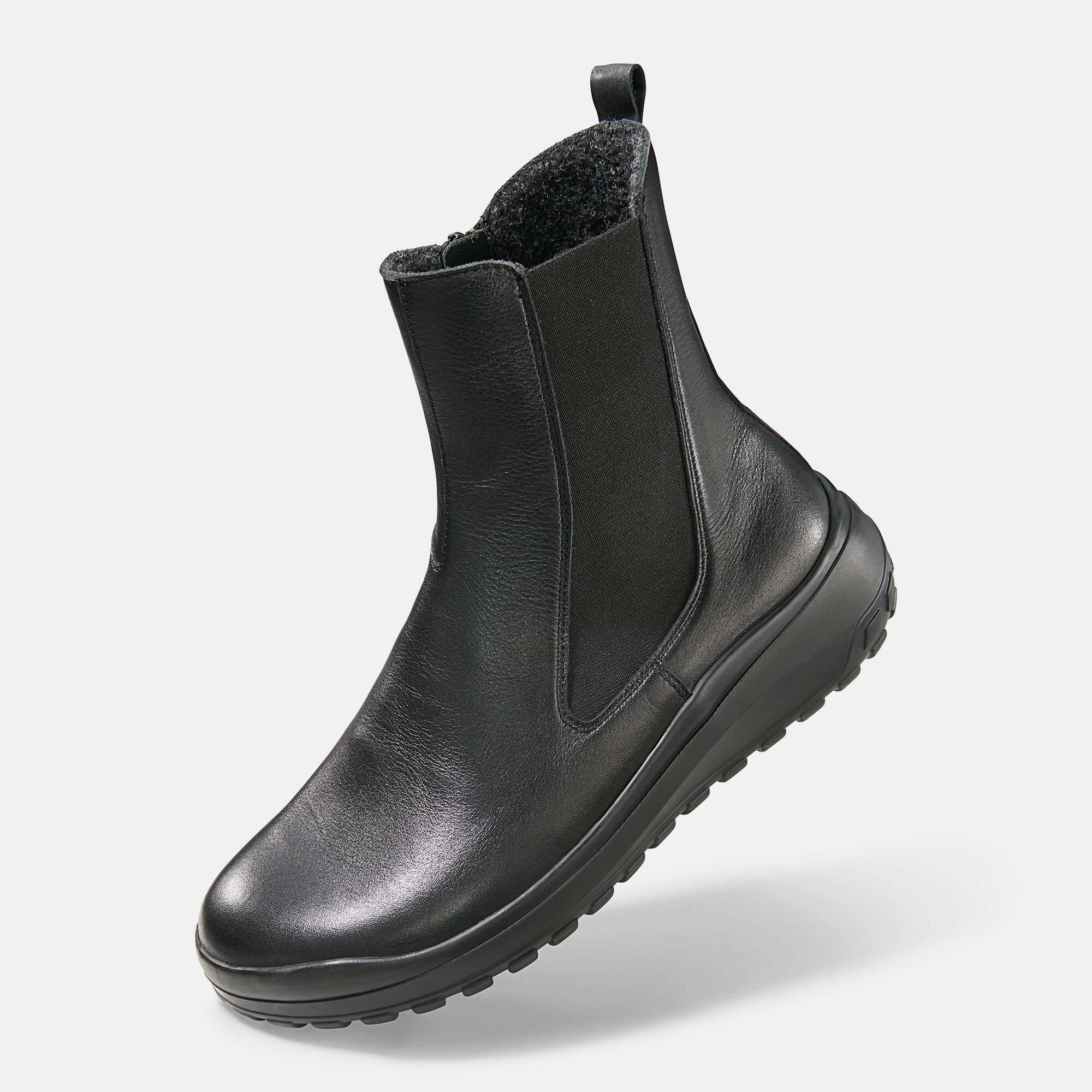 Dunkelblaue Leder-Schnürschuhe mit heller Gummisohle und sichtbarem Markenlogo innen.
