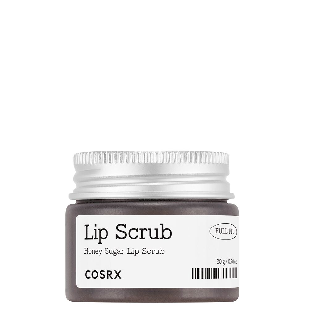 Ein kleiner Tiegel mit silbernem Deckel, beschriftet mit "Lip Scrub Honey Sugar Lip Scrub COSRX".