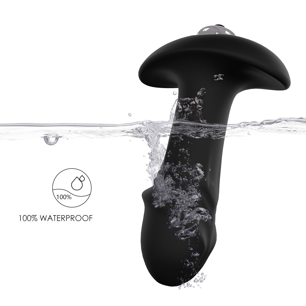 Schwarzer Analplug mit pilzförmigem Kopf im Wasser. Text: 100% wasserdicht.