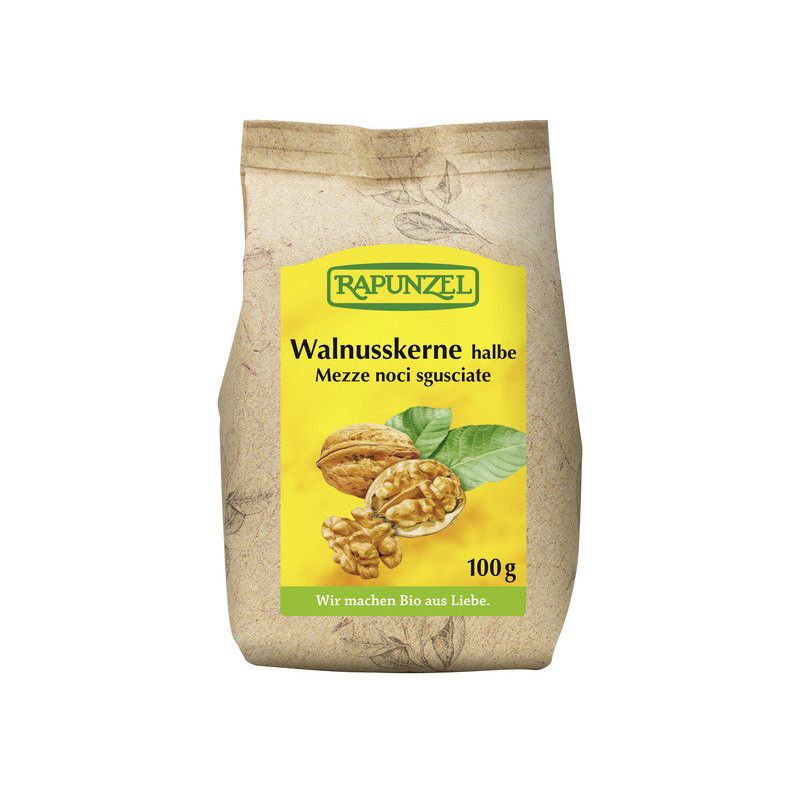 Beutel mit halbierten Walnusskernen. Auf gelbem Etikett: Rapunzel, Walnusskerne halbe, 100g. Abbildung von Walnuss und Blättern.