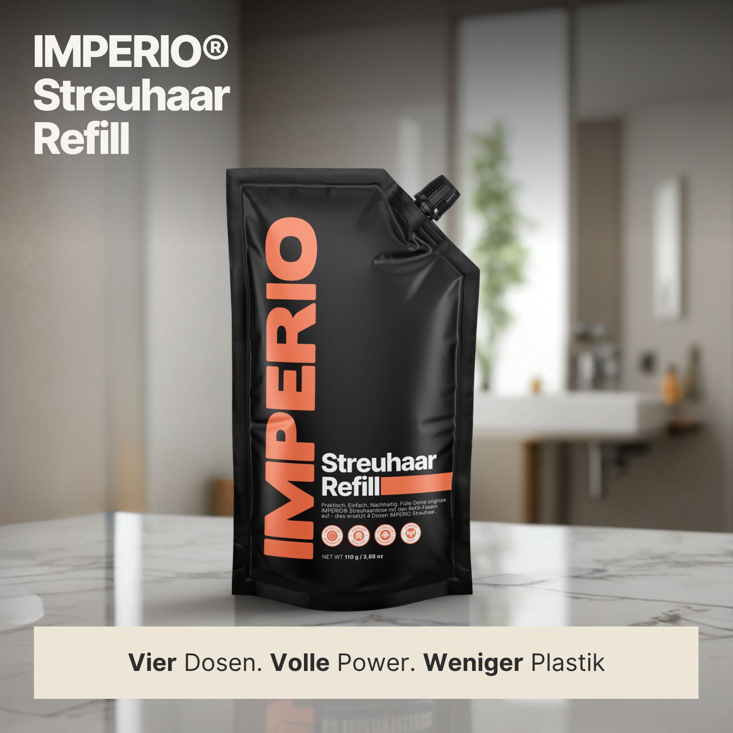 IMPERIO® Streuhaar Refill Pack auf einer Marmoroberfläche. Schwarze Verpackung mit orangefarbenem Schriftzug. Hintergrund: Badezimmer.