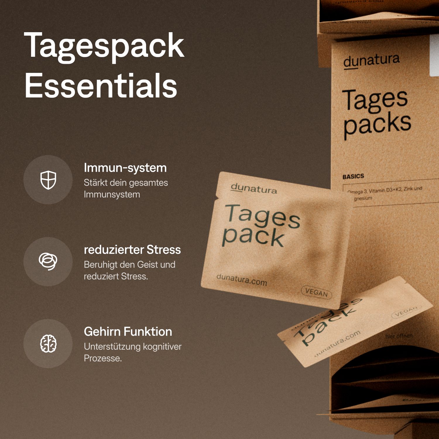 Produktverpackung "Tagespack Essentials" mit Beutel. Text: "dunatura", "Vegan". Grafiken: Immunsystem, Stress, Gehirnfunktion.