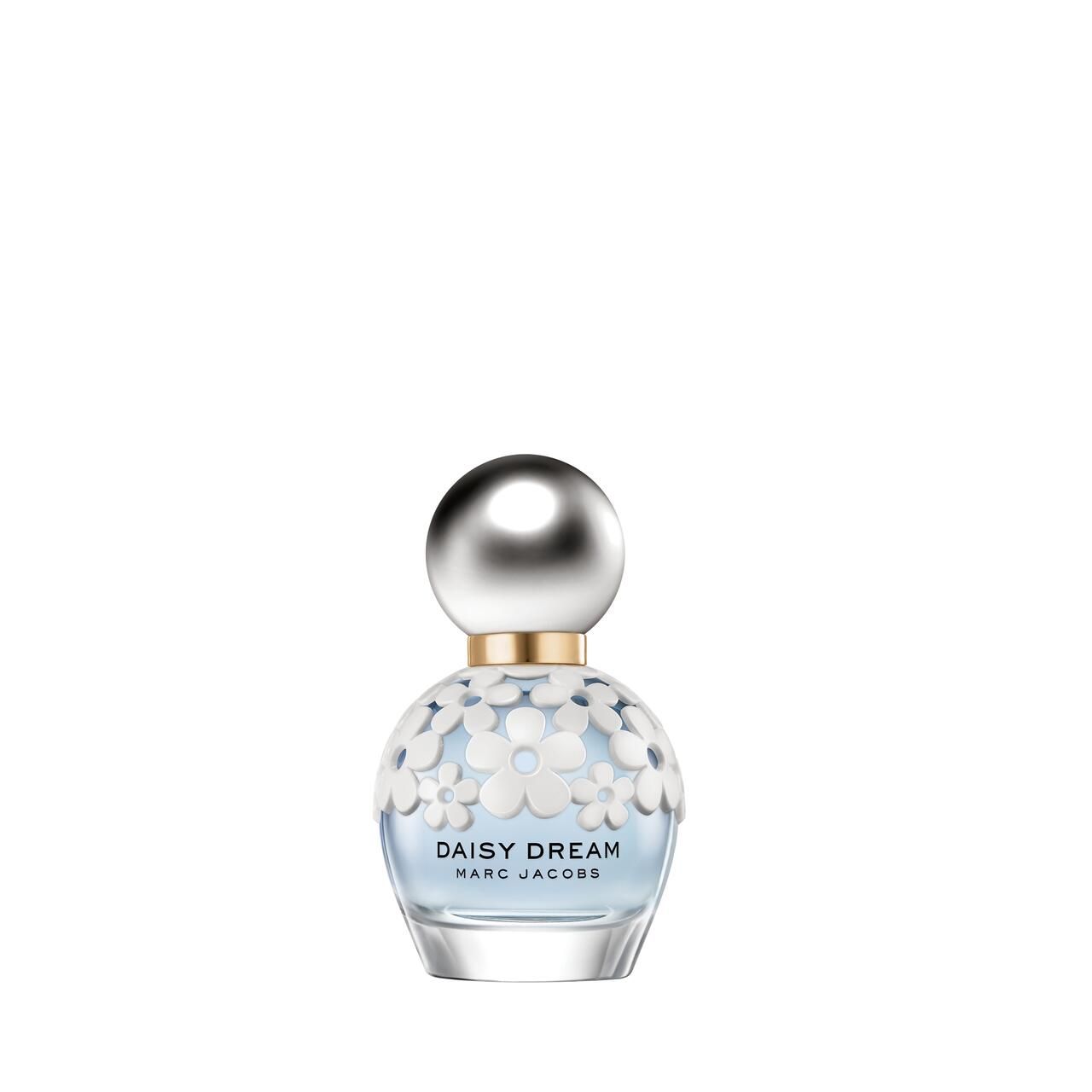 Parfümflasche mit silbernem Deckel und weißen Blüten. Aufschrift: Daisy Dream, Marc Jacobs.