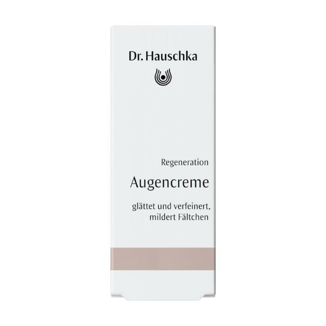 Weiße Tube mit braunem Streifen. Aufschrift: Dr. Hauschka, Regeneration Augencreme, Regenerating Eye Cream.