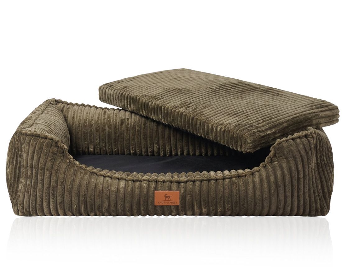 Braunes Hundebett aus Cord mit abnehmbarem Kissen.