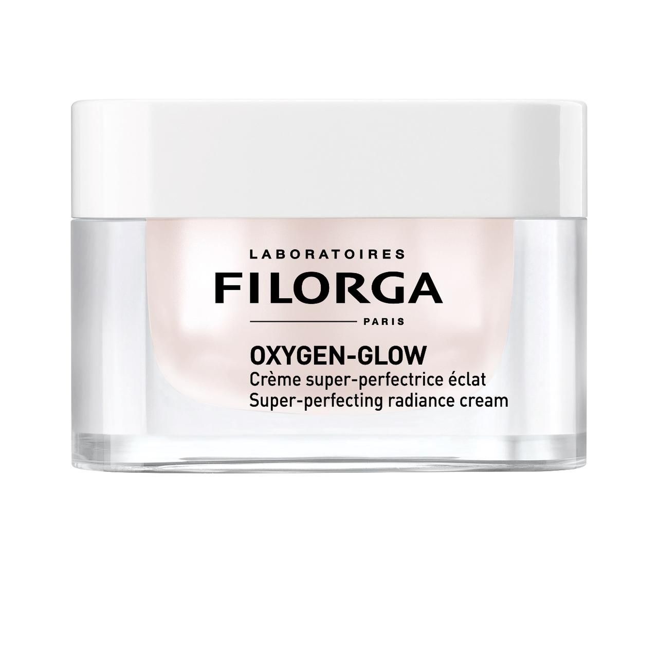 Filorga Oxygen-Glow Creme. Weißer Deckel, transparente Dose. Schriftzug: FILORGA, OXYGEN-GLOW, Crème super-perfectrice éclat.