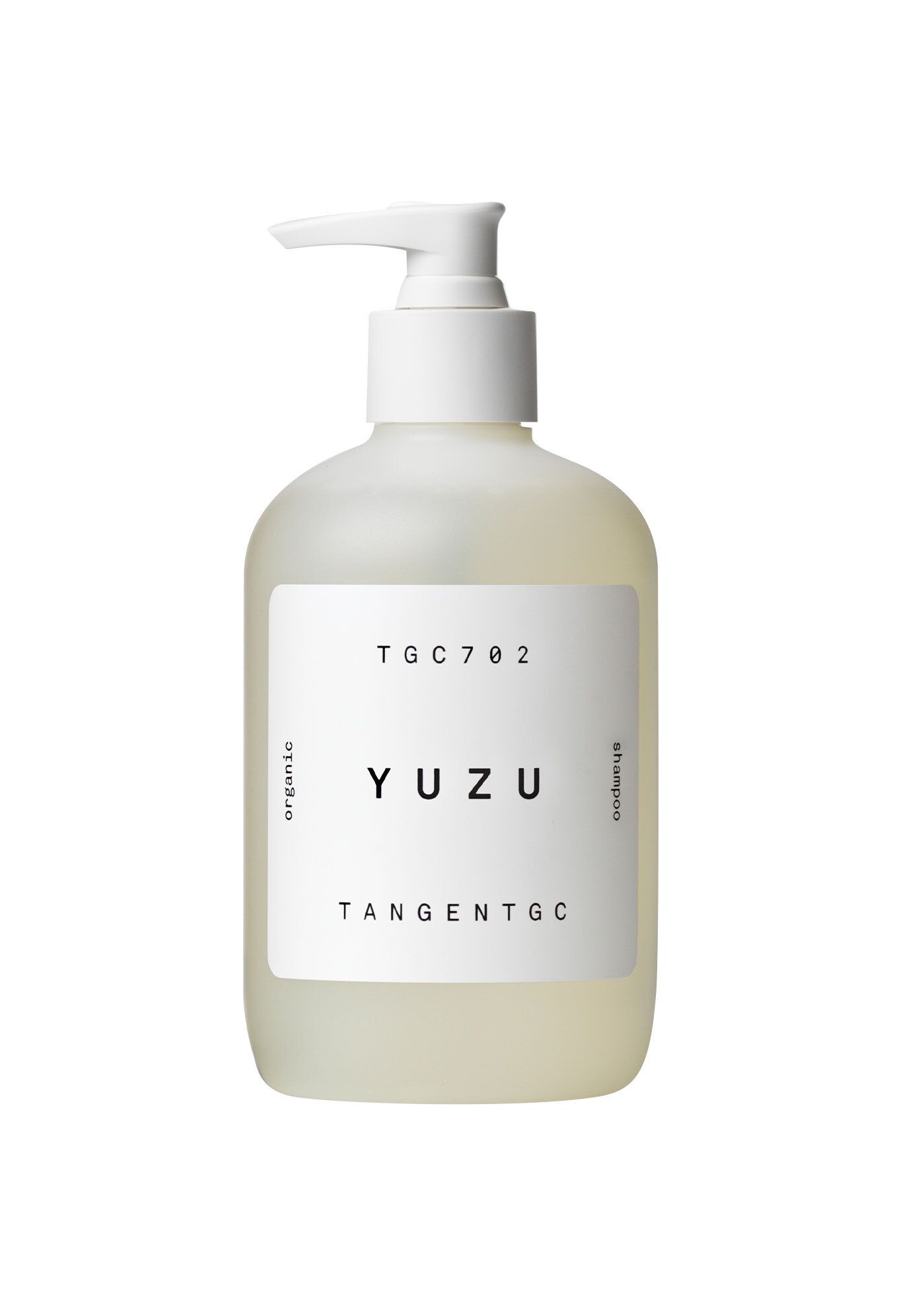 Flasche mit weißem Pumpkopf. Aufkleber mit "YUZU" und "Tangent GC". "Shampoo" und "organic" sind ebenfalls beschriftet.