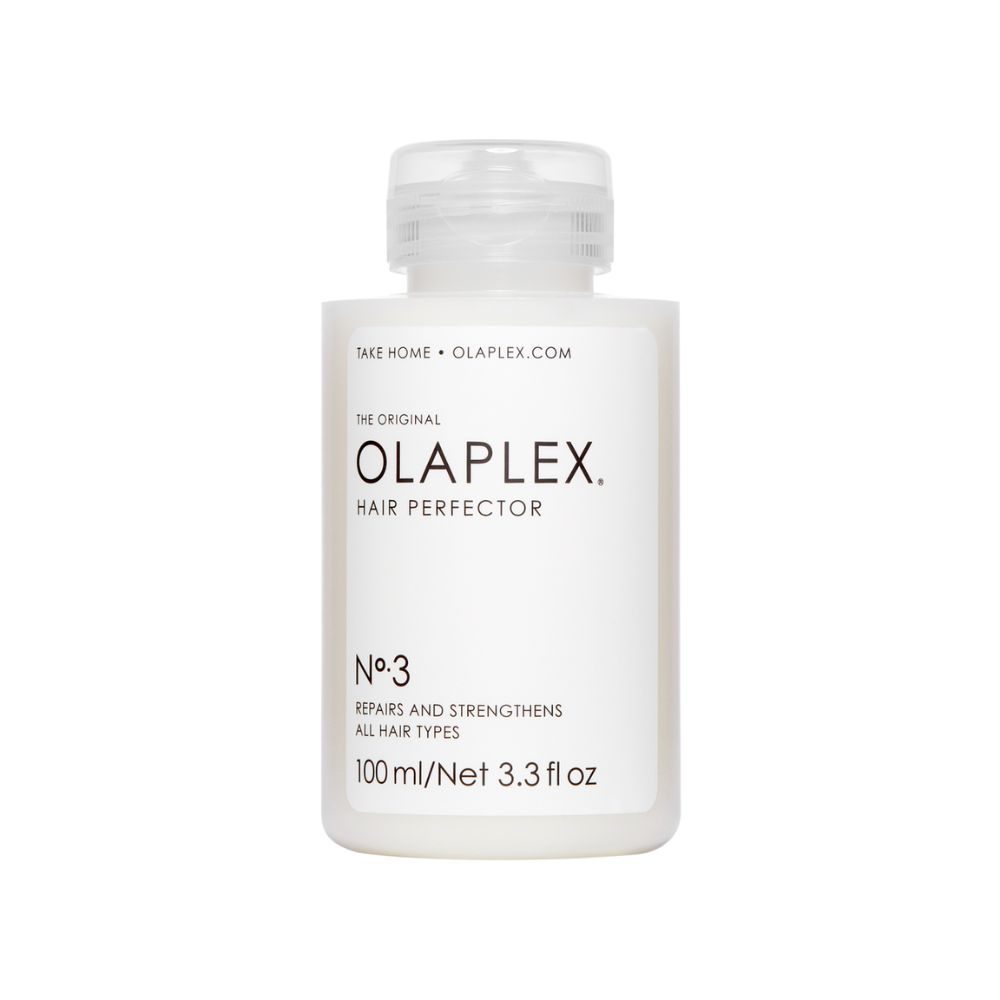 Olaplex No.3 Hair Perfector. Weiße Flasche mit Klappverschluss. Produktetikett mit Text: Olaplex, No.3, und weitere Informationen.