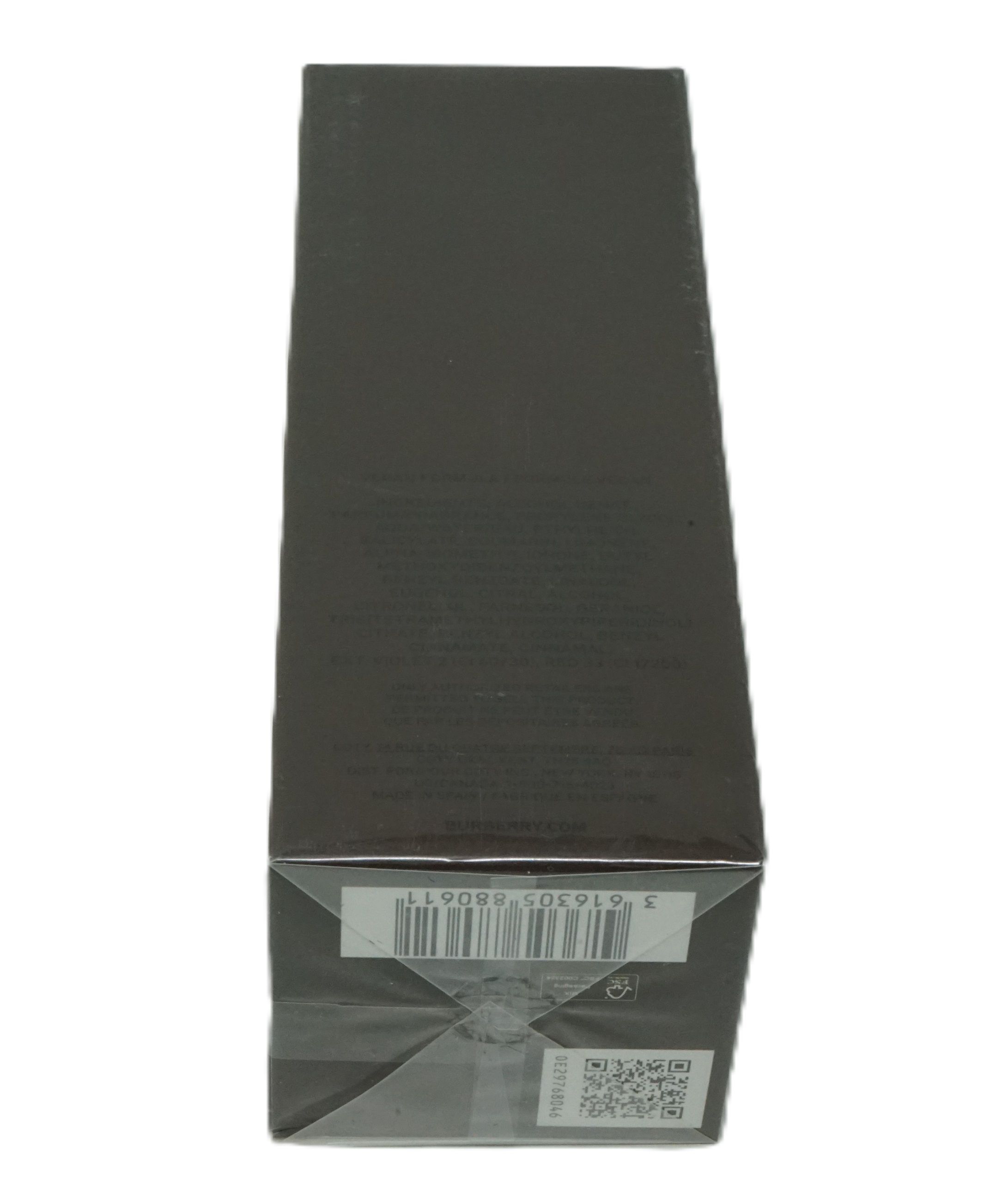 Schwarze Verpackung, Ansicht von unten. Barcode und QR-Code sichtbar.