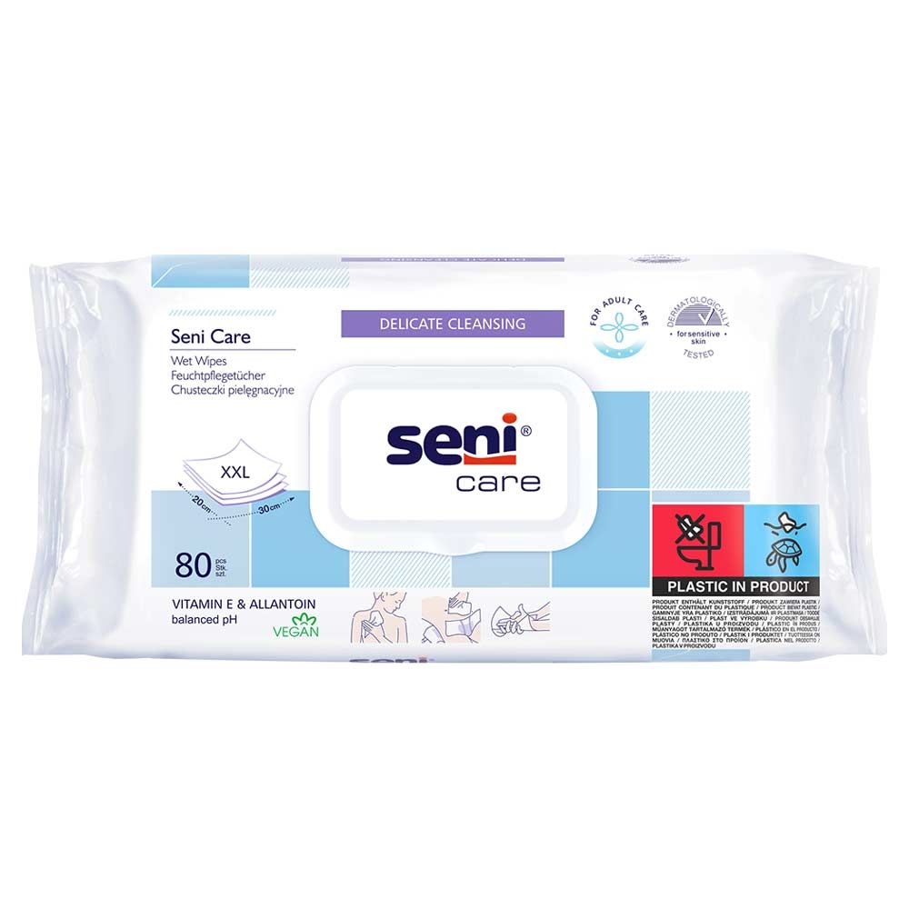 Feuchtpflegetücher a80-Packung. Weiße Verpackung mit blauen Akzenten. Seni Care Logo. Text: Delicate Cleansing, Vitamin E & Allantoin, 80 Tücher. Vegan.