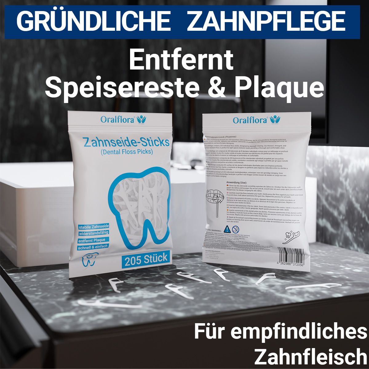 Zwei Packungen Zahnseide-Sticks. Aufschrift: Zahnseide-Sticks, 205 Stück. Text: Entfernt Speisereste & Plaque. Für empfindliches Zahnfleisch.
