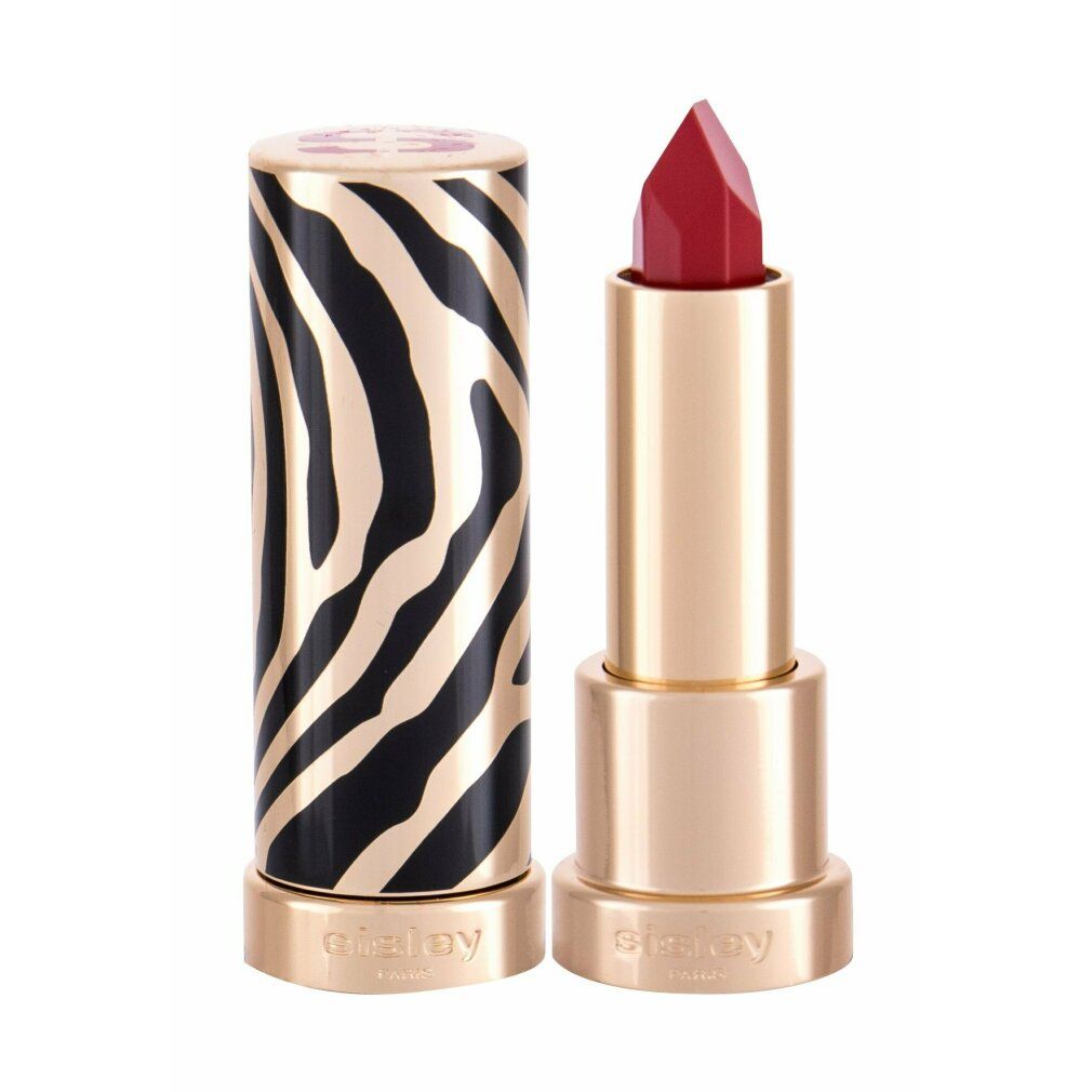 Sisley Le Phyto Rouge Lippenstift, geöffnet. Goldfarbener Stift, roter Lippenstift, schwarze und goldene Zebra-Hülle. Sisley-Logo auf dem Stift.