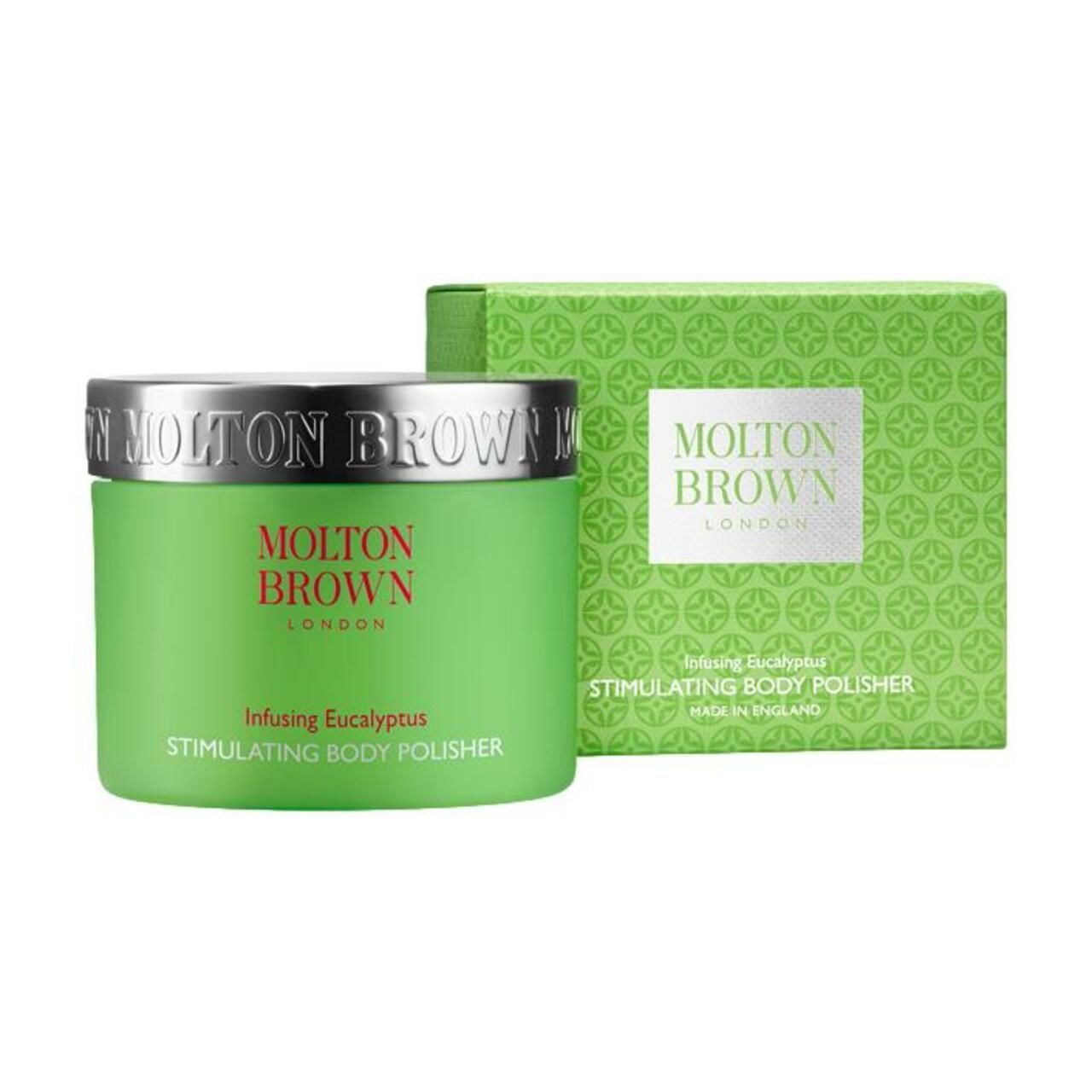 Grüner Tiegel und Schachtel. Aufschrift: Molton Brown, Infusing Eucalyptus, Stimulating Body Polisher. Verpackung mit Muster.
