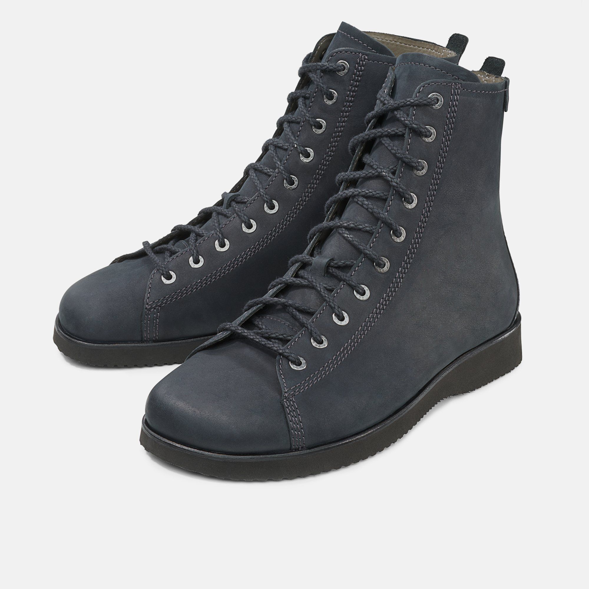 Dunkelblaue Stiefeletten mit Schnürung und flacher Sohle. Seitliche Reißverschlüsse. Hellere Schnürsenkelösen.