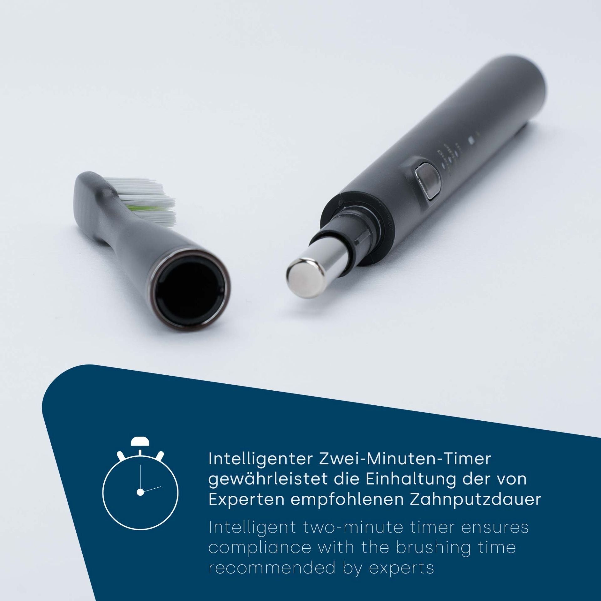 Schwarze elektrische Zahnbürste, zerlegt. Abnehmbarer Bürstenkopf. Intelligenter 2-Minuten-Timer.