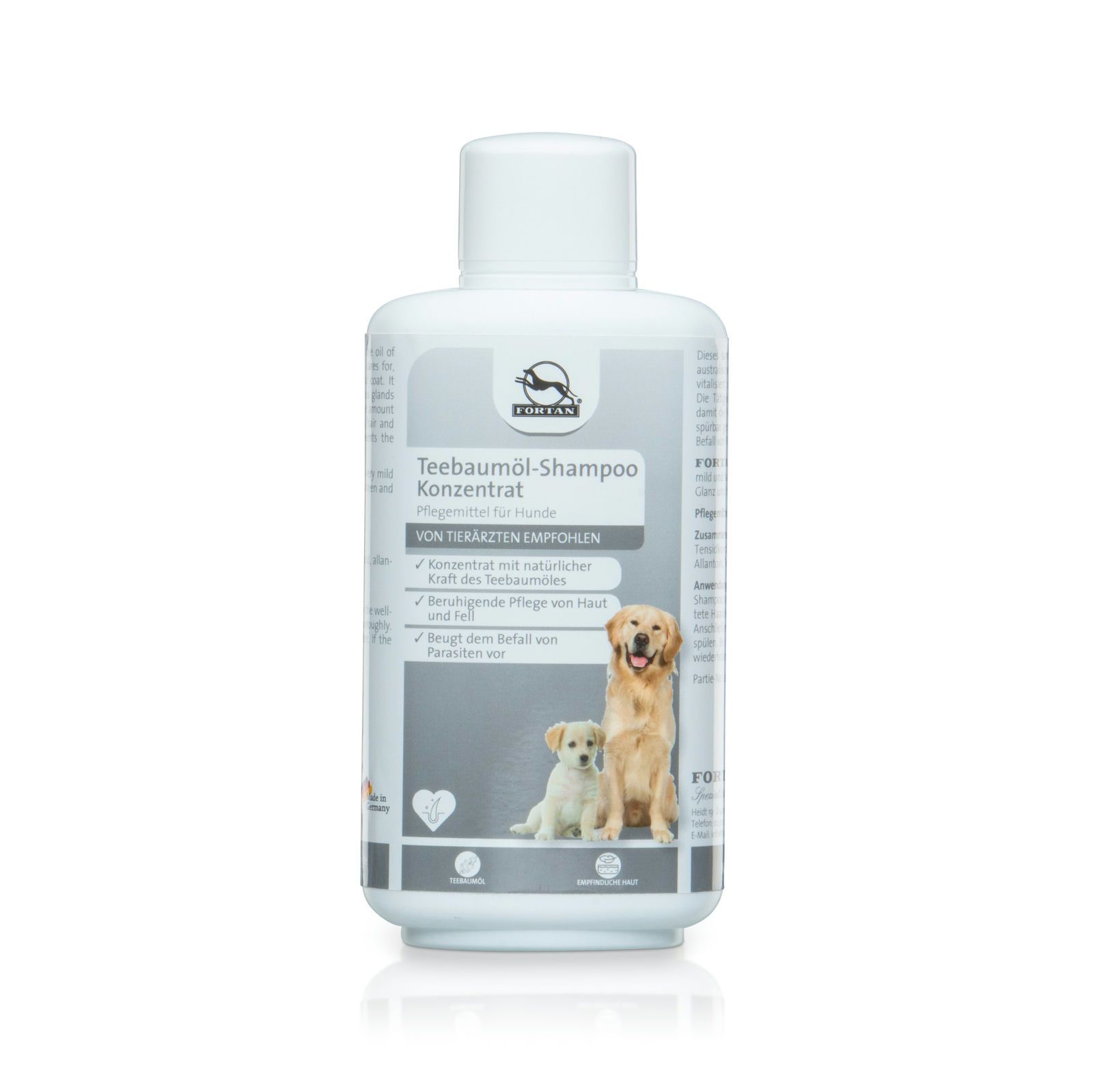 Weiße Flasche FORTAN Teebaumöl-Shampoo für Hunde. Etikett mit Logo, Produktname und Abbildung von zwei Hunden.