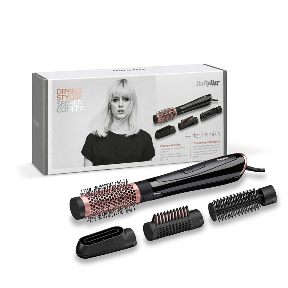 Produktverpackung mit Haartrockner und Aufsätzen. Schwarz und Roségold. Die Verpackung zeigt eine Frau.