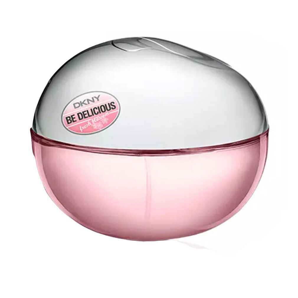 Runder, rosa Flakon mit silbernem Deckel. Aufschrift: DKNY Be Delicious Fresh Blossom.