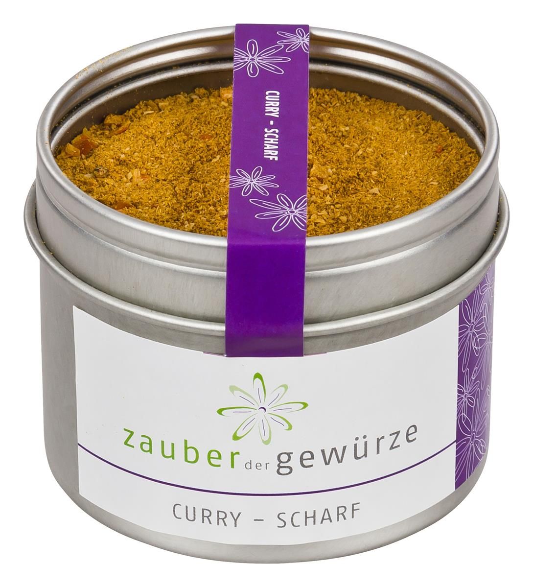 Runde Dose mit Curry-Gewürz. Weißes Etikett mit Schriftzug 'Zauber der Gewürze' und 'Curry - scharf'. Lila Band.