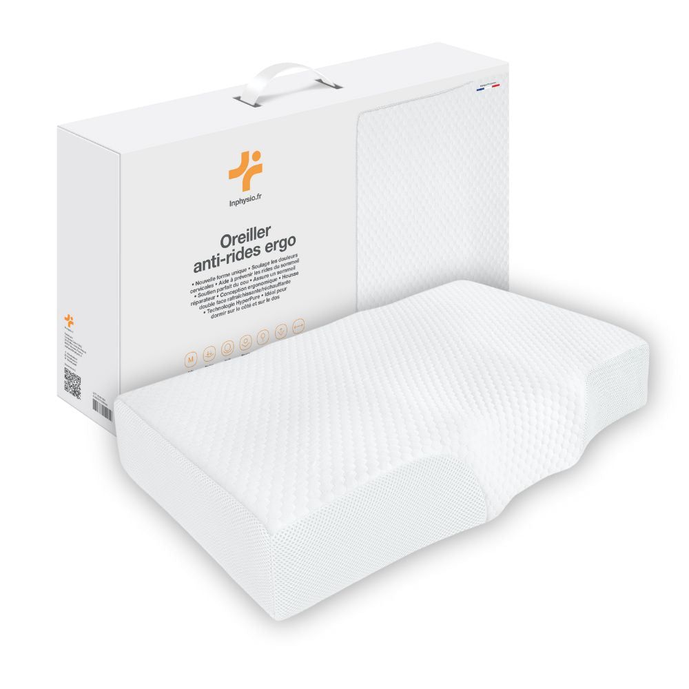Ergonomisches Kissen. Weiß, rechteckig mit Aussparung. Verpackung mit Produktname und Logo. Griff oben.