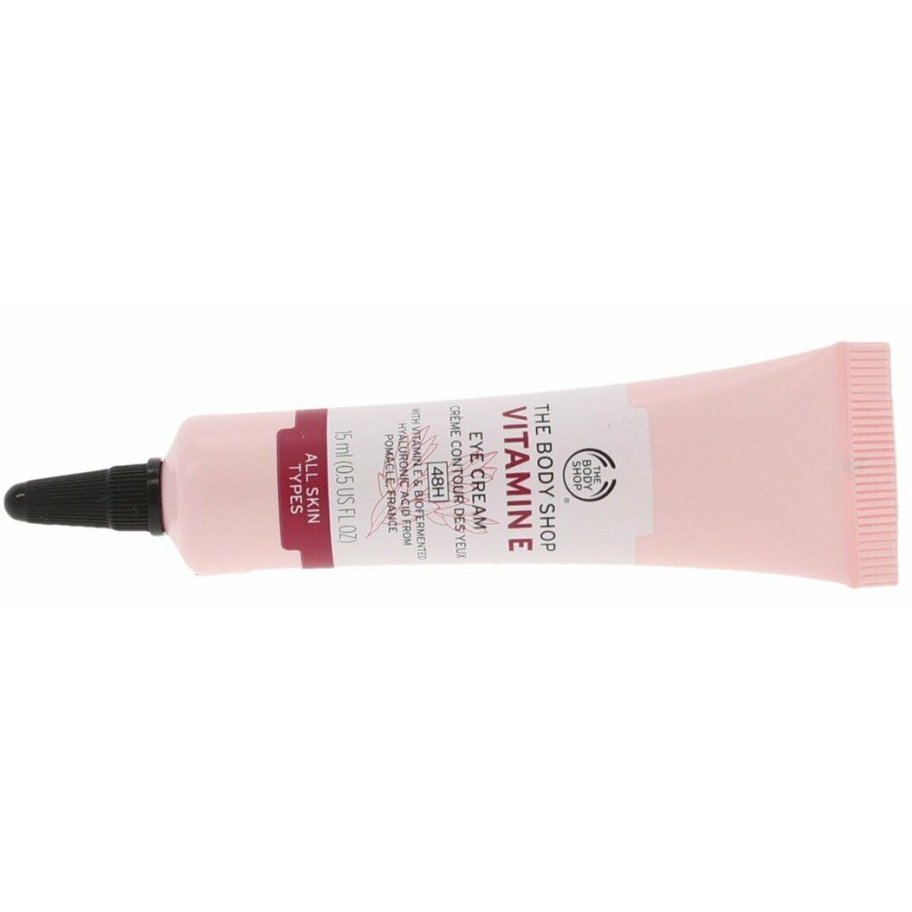 Rosa Tube mit schwarzem Verschluss. Aufschrift: Vitamin E Eye Cream, The Body Shop. Für alle Hauttypen.