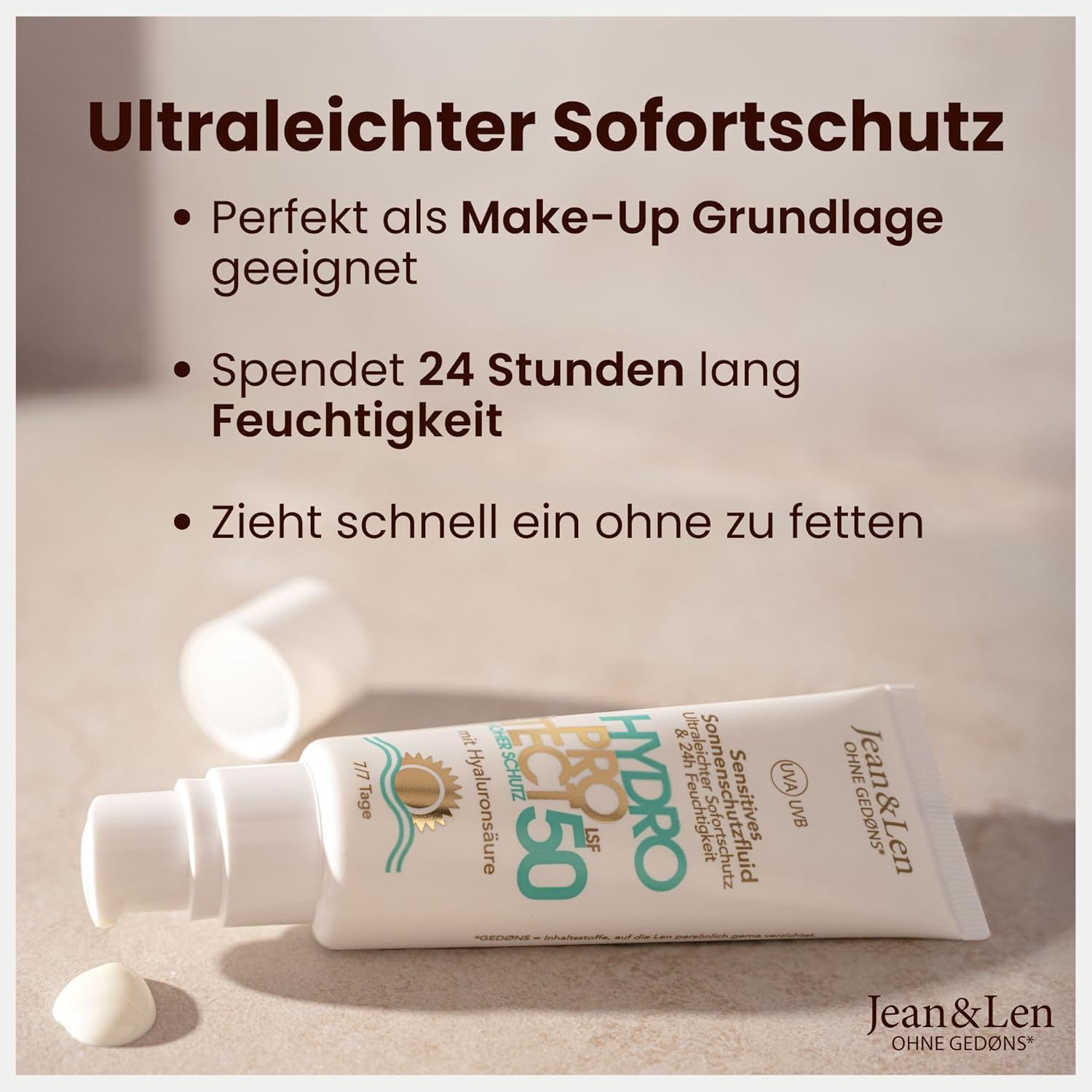 Tube Jean & Len Sensitiv Sonnenschutzfluid LSF 50, Deckel daneben. Text: Hydro Protect, LSF 50, Hyaluronsäure. Auf hellem Hintergrund.