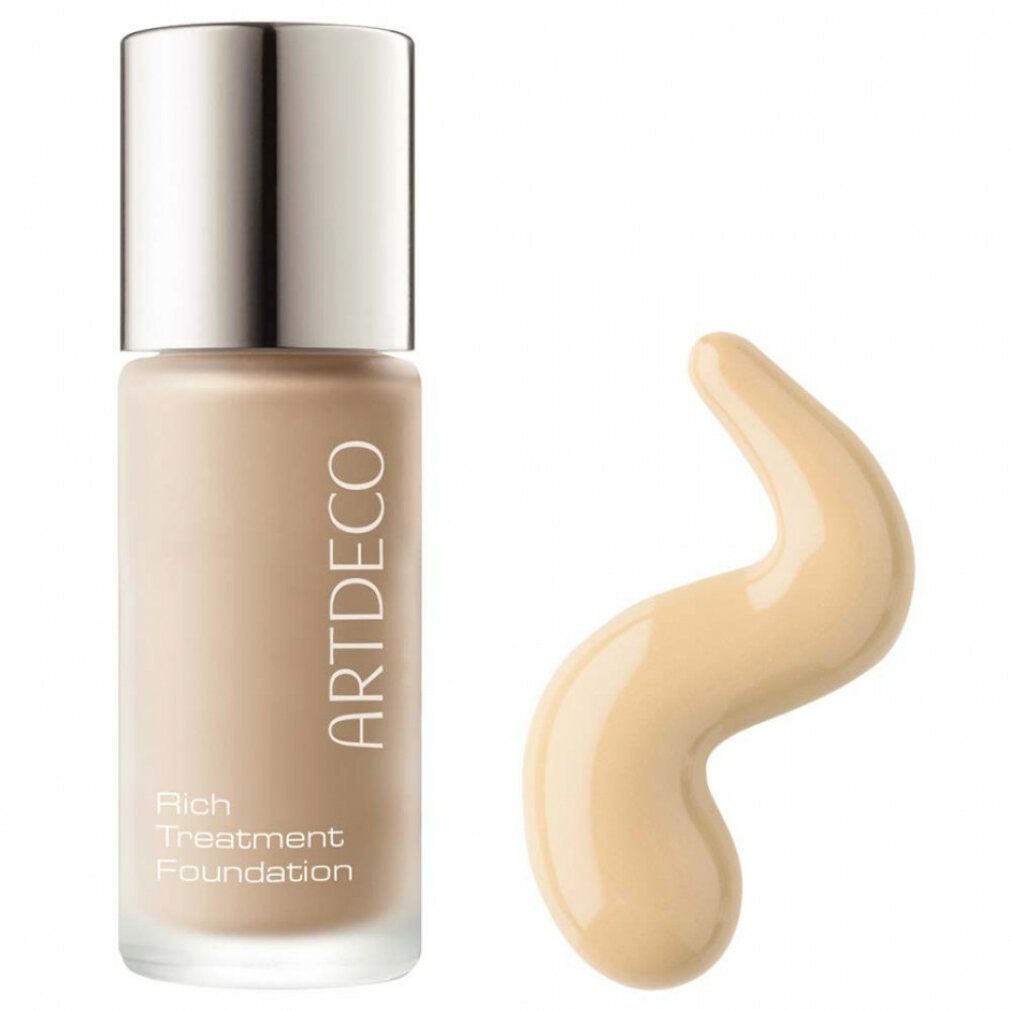 Artdeco Rich Treatment Foundation Flasche und Produktprobe. Flasche mit silbernem Deckel, Schriftzug. Probe in Wellenform.
