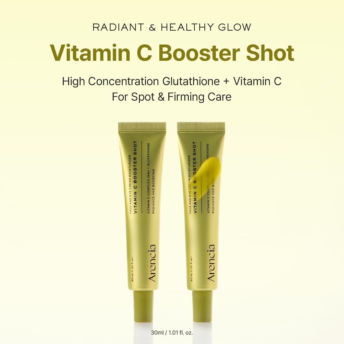 Zwei grüne Tuben Arencia Vitamin C Booster Shot, eine leicht geöffnet.