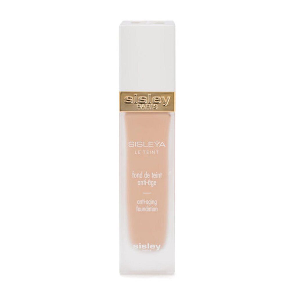 Sisley Sisleya Le Teint. Flakon mit beiger Foundation, weißer Deckel. Goldener Schriftzug. Anti-Aging-Foundation.