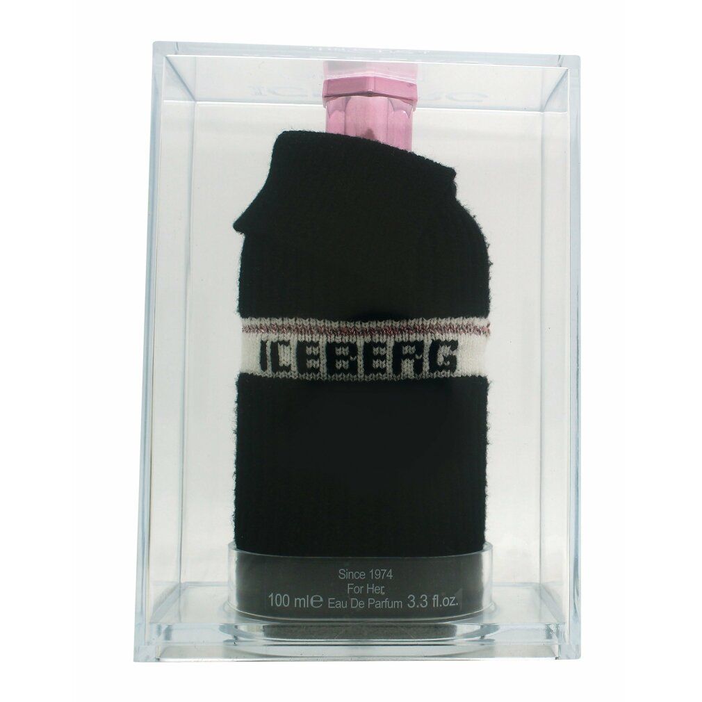 Parfümflasche in schwarzem Pullover-Design, in transparenter Box. Aufschrift ICEBERG und Since 1974. Rosa Verschluss.