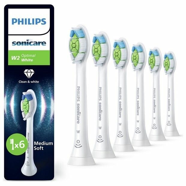 Zahnbürstenaufsätze, weiß mit grünen und blauen Borsten. Verpackung mit Philips Sonicare Logo und Produktbezeichnung.
