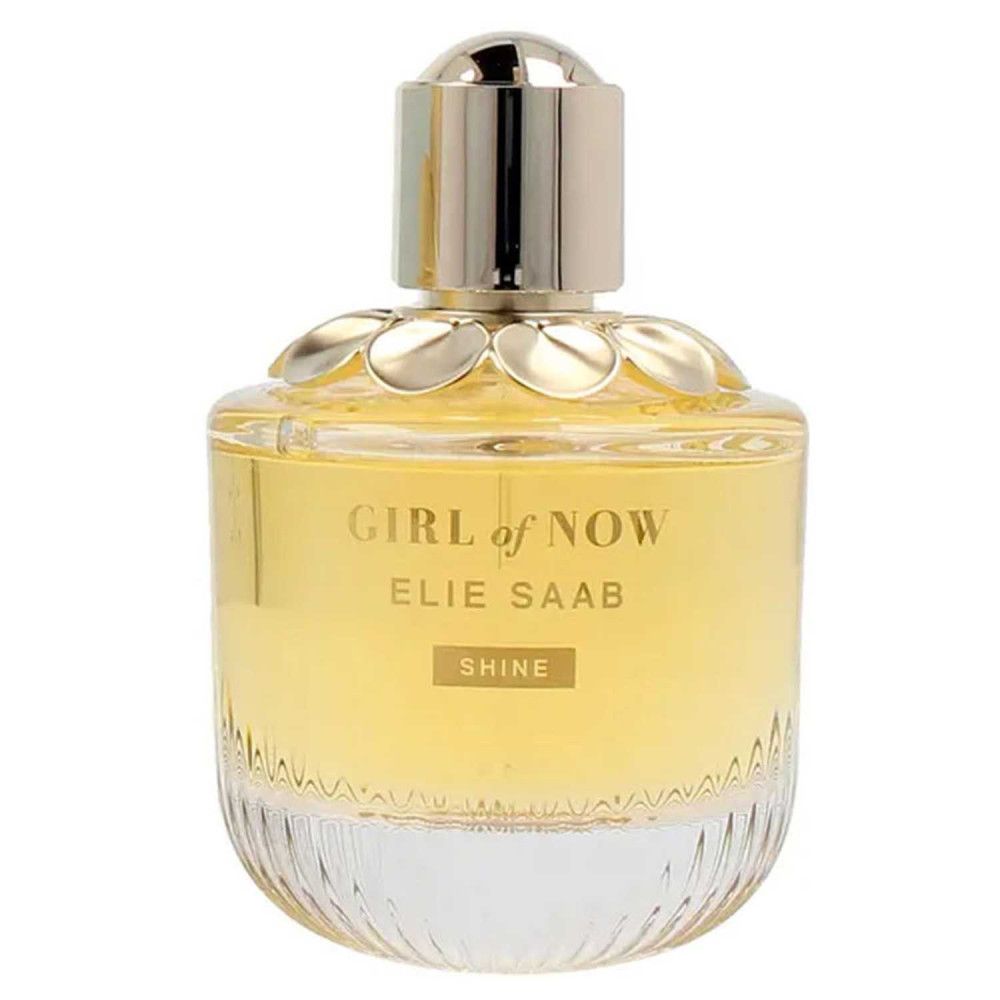 Elie Saab Girl of Now Shine Eau de Parfum Flakon mit goldenem Verschluss und Blumenverzierung.