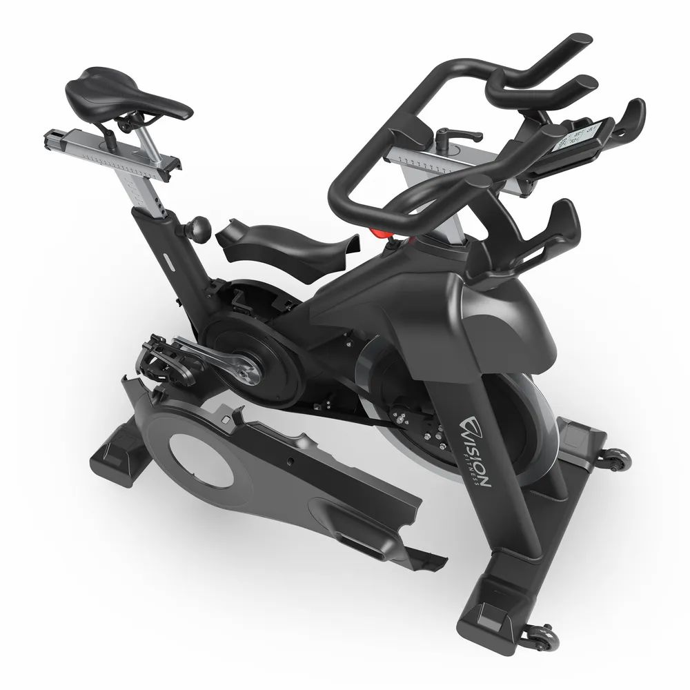 Indoor Cycle mit abgenommenen Abdeckungen. Sichtbar: Rahmen, Schwungrad, Pedale, Sattel, Lenker.