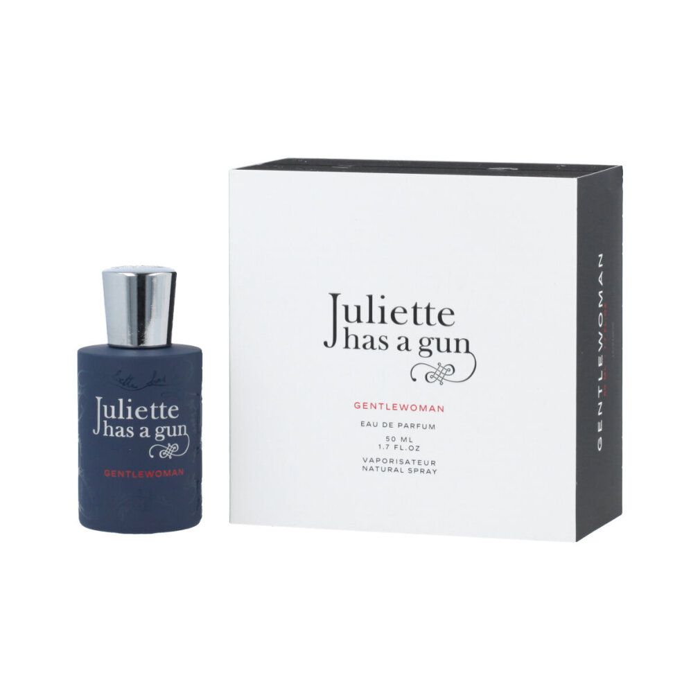 Dunkelblaue Parfumflasche und weiße Schachtel. Auf der Flasche und der Schachtel steht "Juliette has a gun Gentlewoman".