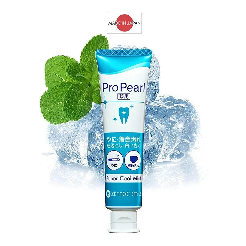 Zahncreme-Tube ProPearl Super Cool Mint, umgeben von Eiswürfeln und Minzblättern. Japanische Beschriftung, Made in Japan.