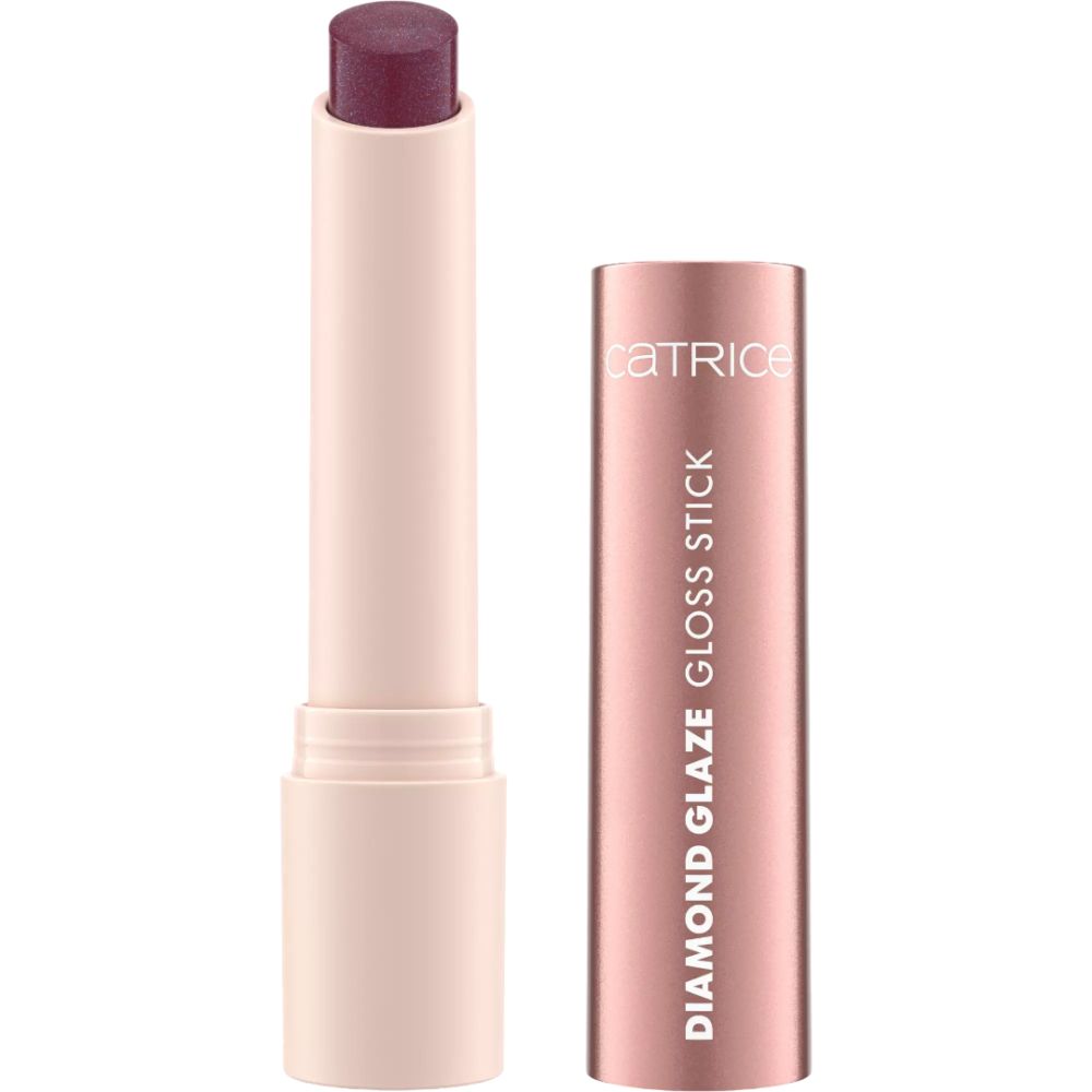 Ein aufgedrehter, pfirsichfarbener Lippenstift mit glänzendem Finish und roségoldener Hülse mit Aufdruck.