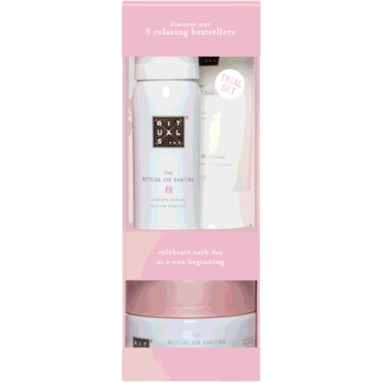 Geschenkset mit drei Produkten in rosa Verpackung. Enthält Duschschaum, Körpercreme und Körperpeeling. Mit Aufschrift "Trial Set".